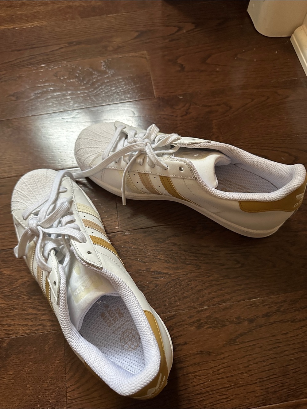 adidas Women's White Sneakers with Gold Stripes